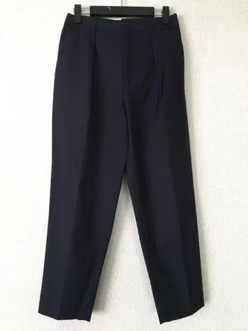 MARKAWARE 네이비 테이퍼드 슬랙스 버튼 포함