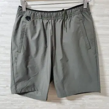 뉴발란스 THE CITY 크로스 하프 팬츠 AMS35029