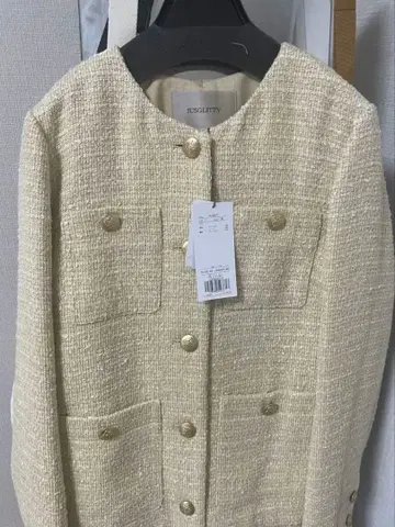 JUSGLITTY 아이보리 트위드 버튼 자켓