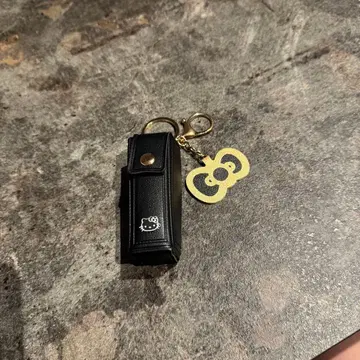 [키티] 헬로키티 리본형 참 부착 립 파우치