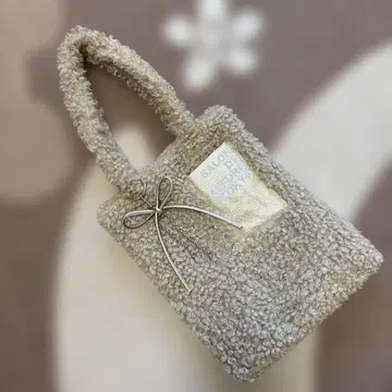 SALON DE ALFURD 에코 퍼 카르간 램스킨 풍 가죽 포켓 토트