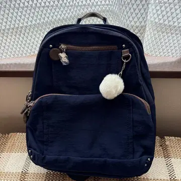 카나나 프리웨이 네이비 백팩 퍼 달린 참