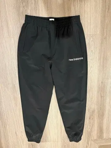 뉴발란스 우븐 트랙 조거 팬츠