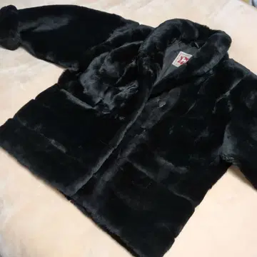 무스탕 코트 새끼 양 스페인산