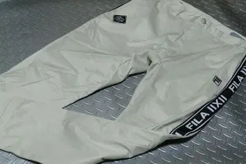 2025 가을/겨울 샘플 휠라 경량 4WA 스트레치 팬츠 BE/BK