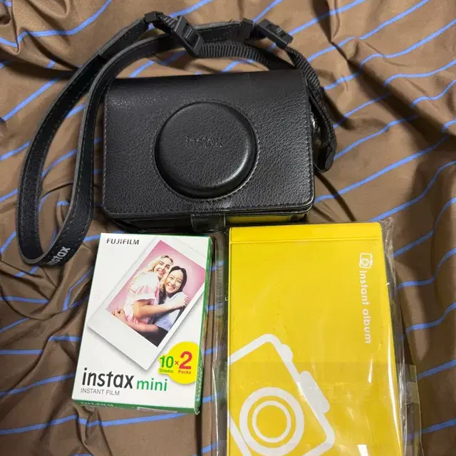인스탁스 미니에보카메라 케이스 + 앨범 + 필름