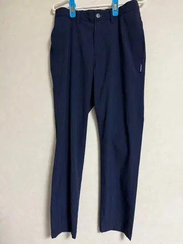 로사센 네이비 체크 무늬 팬츠