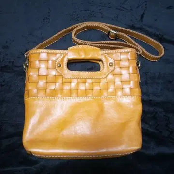 오렌지 가죽 꼬임 숄더백