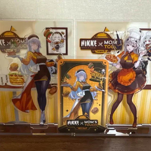 니케 맘스터치 콜라보 아크릴 스탠드 나유타, 모더니아