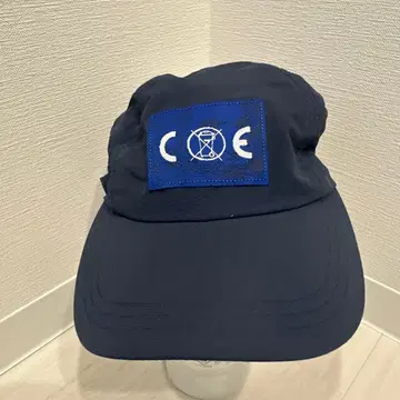 네이비 캡 로고 부착 조절