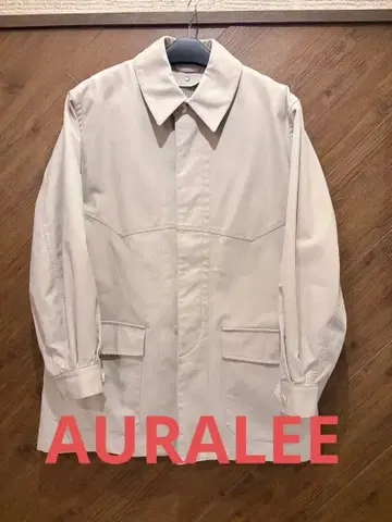 베이지 커버올 긴팔 포켓 부착