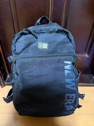 NEW ERA 카모 패턴 블랙 백팩