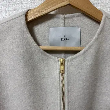 TIARA 리버 ZIP 자켓 코트 아이보리