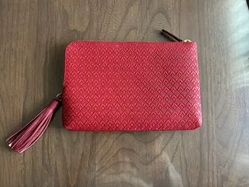 인덴 태슬 장식 클러치 파우치