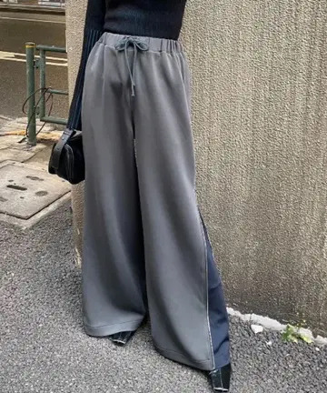 AIC. AIC 사이드 지퍼 허리 레이어드 트랙 팬츠