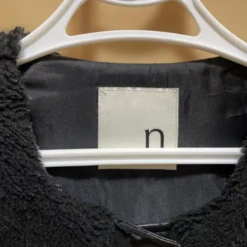 n 블랙 플리스 자켓