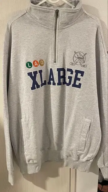 XLARGE 화이트 하프 지퍼 트레이닝복 91