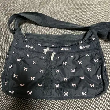 리스포츠 리본 무늬 숄더백 블랙