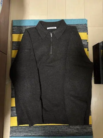 suare 하프 지퍼 니트