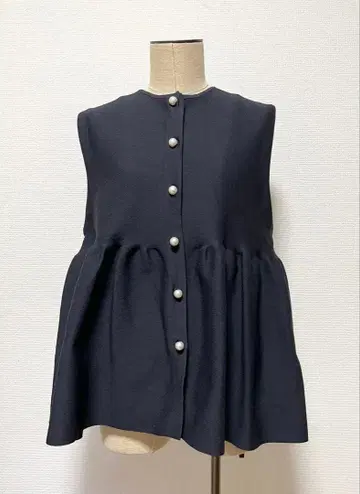 UNFILO 슬리브리스 플레어 베스트 네이비