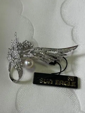 SUN EAGLE (선이글)의 피닉스/새 모티브 브로치입니다.