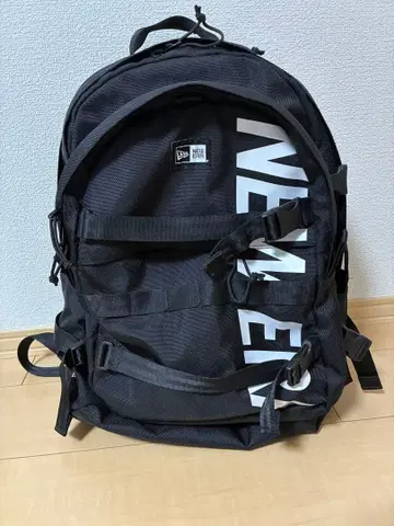 블랙 NEVER 로고 백팩