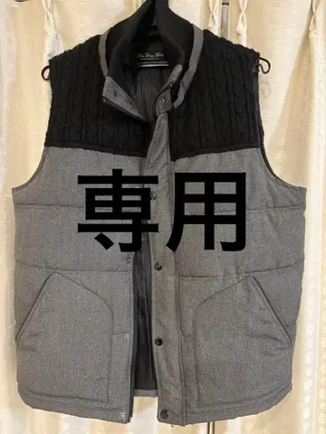 그레이와 블랙의 케이블 니트 베스트