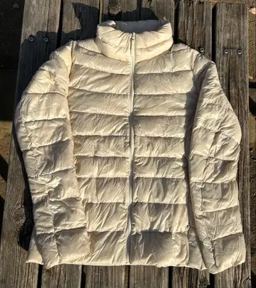 유니클로 UNIQLO 울트라 라이트 다운 자켓 아이보리 아웃도어 캠핑