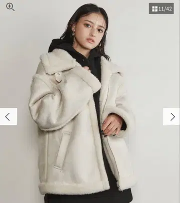 MURUA 미디 루즈 페이크 무스탕 코트