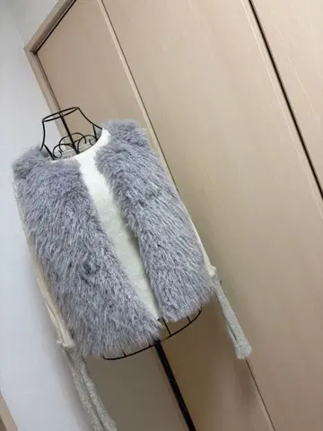 새상품 이시카와라보 aura de attirer 퍼 베스트