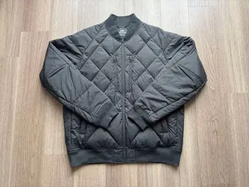 White Mountaineering 리사이클 하이브리드 다운 자켓