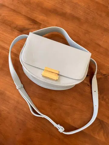 셀포드 라이트 블루 플랩식 핸드백