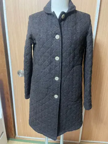 트래디셔널 웨더웨어의 퀼팅 코트