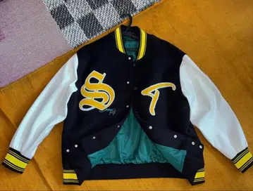 RE730 (알이이세븐서티) 바시티 자켓