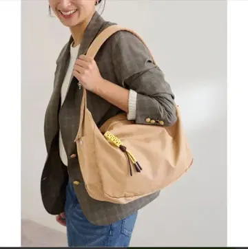 NOMADE 베이지 숄더백 태슬 포함