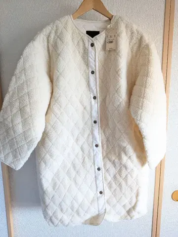 스튜디오 클립 아이보리 퀼팅 롱 코트