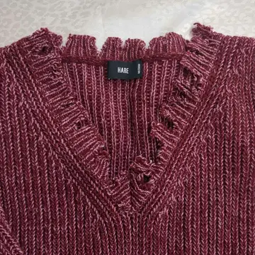 HARE 데미지 V넥 스웨터