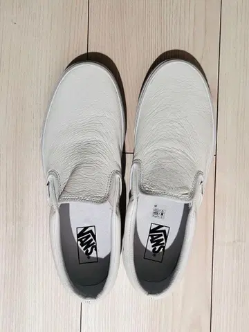 Vans 화이트 가죽 슬립온
