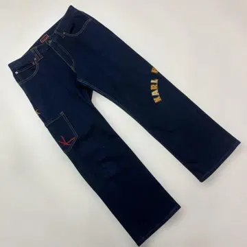 칼 헬무트 로고 자수 사용 스트레치 데님 팬츠