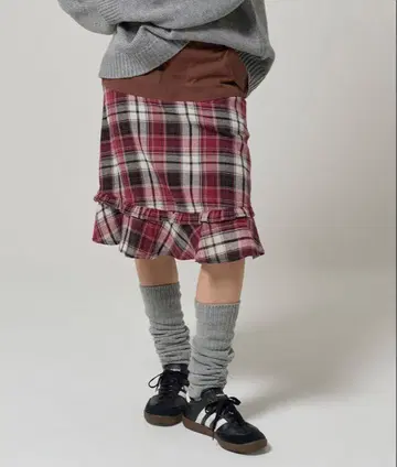 도킹 밑단 프릴 스커트 TINA: JOJUN