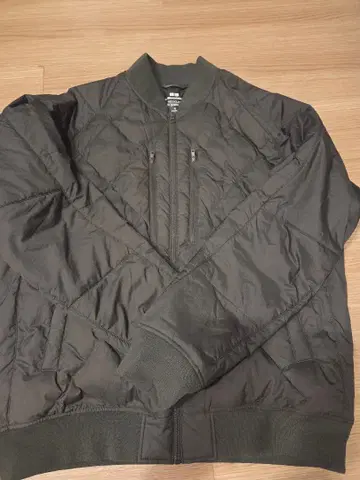 White Mountaineering 리사이클 하이브리드 다운 자켓