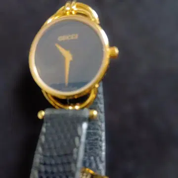 (가격 대폭 인하) GEOCCI 골드 블랙 아날로그 시계