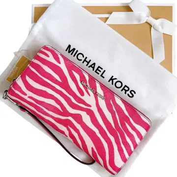 마이클코어스 장지갑 제브라 프린트 카프헤어 콘티넨탈 지갑