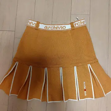 archivio 오렌지 플리츠 스커트