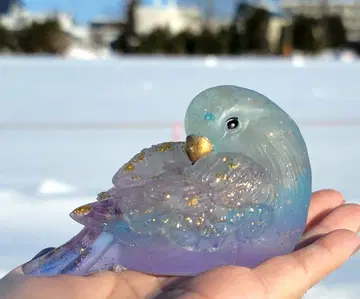수호운의 날갯짓하는 파랑새 오르가나이트