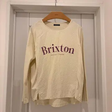 놈브르 임페어 로고 긴팔 T셔츠 크림