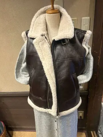 브라운 인조 가죽 보아 후드 코트