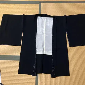 문장 검은색 겉옷