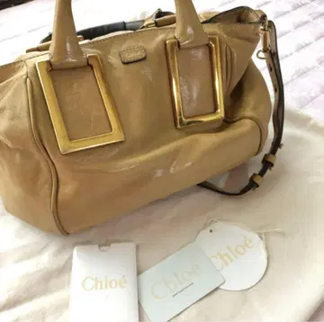 끌로에 플라밍고 가죽 핸드백