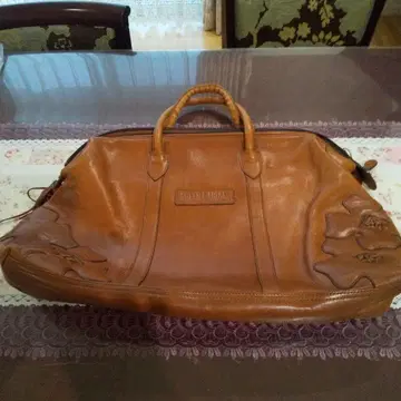 이비자 브라운 가죽 토트백